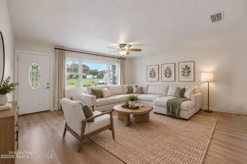 Living - 1430 Windward Dr, Melbourne, FL 32935 photo 3 of 9
