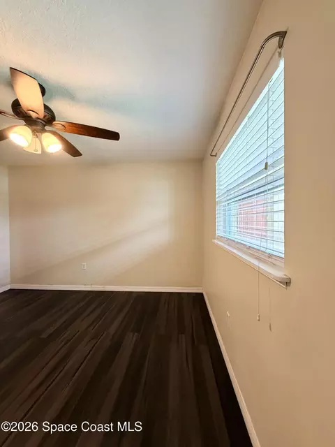 Living - 550 Comanche Ave, Melbourne, FL 32935 photo 2 of 2