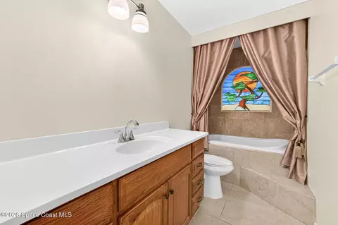 Bath - 1140 Cypress Trace Dr, Melbourne, FL 32940 photo 2 of 3
