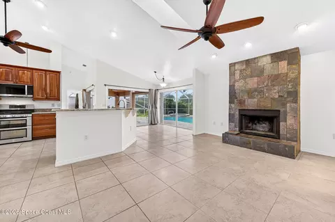Living - 1140 Cypress Trace Dr, Melbourne, FL 32940 photo 9 of 10