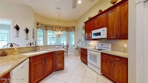 Kitchen - 3123 Forest Creek Dr, Melbourne, FL 32901 photo 2 of 3