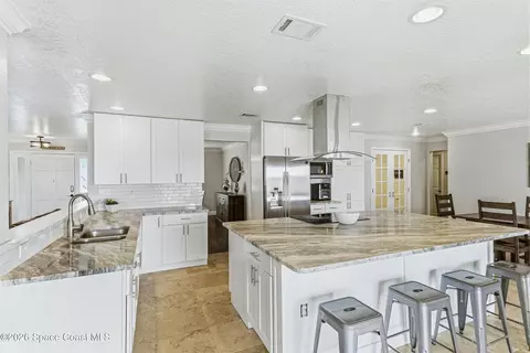 Kitchen - 1031 E River Oaks Dr, Indialantic, FL 32903 photo 2 of 6
