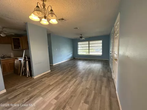 Living - 1487 Sherry Ln, Melbourne, FL 32935 photo 1 of 2