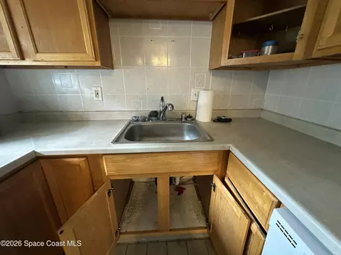 Kitchen - 1487 Sherry Ln, Melbourne, FL 32935 photo 2 of 5