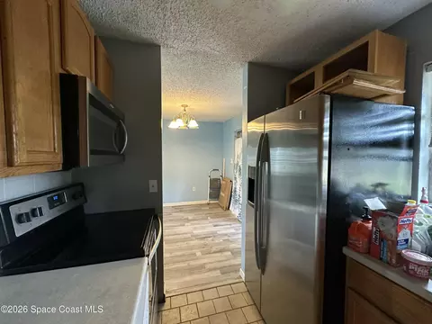 Kitchen - 1487 Sherry Ln, Melbourne, FL 32935 photo 4 of 5