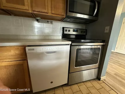 Kitchen - 1487 Sherry Ln, Melbourne, FL 32935 photo 5 of 5