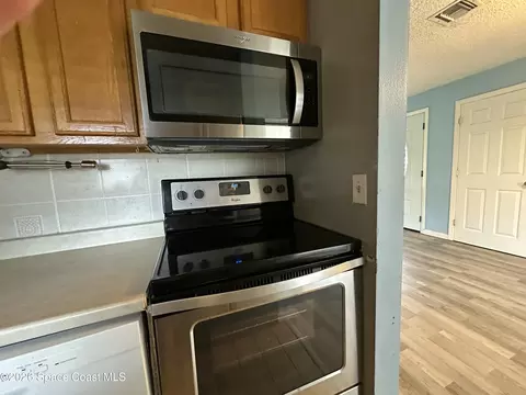 Kitchen - 1487 Sherry Ln, Melbourne, FL 32935 photo 3 of 5