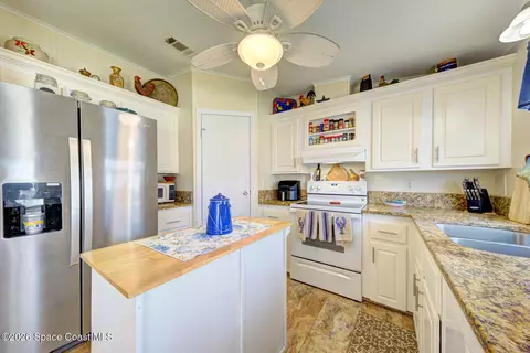 Kitchen - 385 Outer Dr, Cocoa, FL 32926 photo 3 of 5