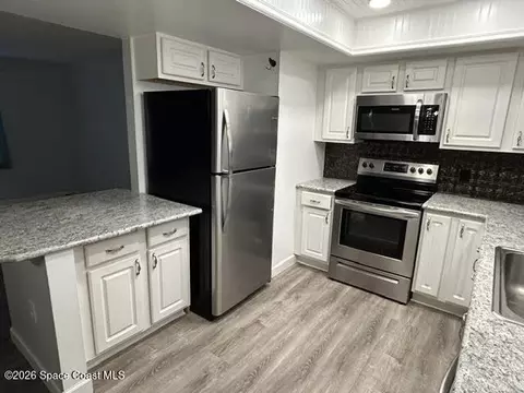 Kitchen - 3653 Longbow Rd, Cocoa, FL 32926 photo 2 of 3