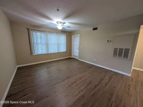 Living - 7667 N Wickham Rd #616, Melbourne, FL 32940 photo 2 of 6