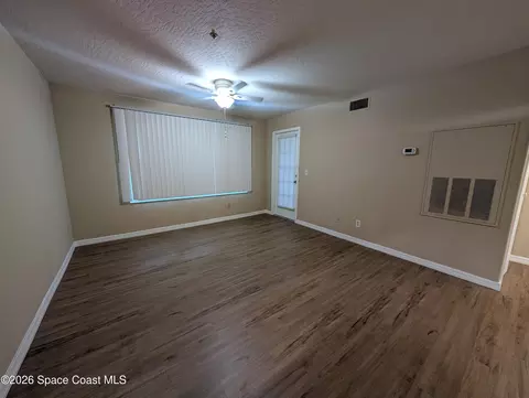 Living - 7667 N Wickham Rd #616, Melbourne, FL 32940 photo 1 of 6