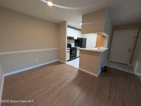 Living - 7667 N Wickham Rd #616, Melbourne, FL 32940 photo 4 of 6