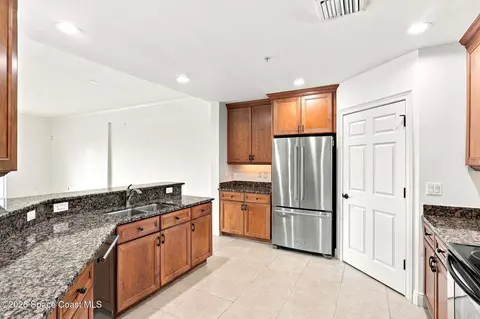 Kitchen - 1437 Pineapple Ave #306, Melbourne, FL 32935 photo 3 of 5