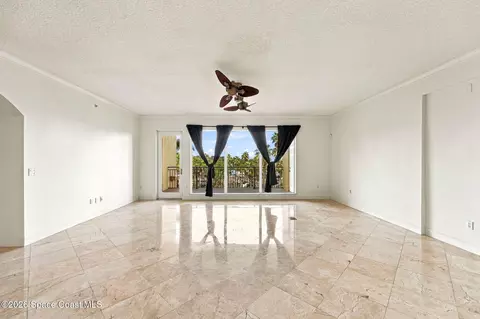 Living - 1437 Pineapple Ave #306, Melbourne, FL 32935 photo 2 of 11