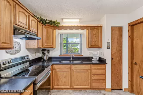 Kitchen - 648 Orange Ct, Rockledge, FL 32955 photo 3 of 5