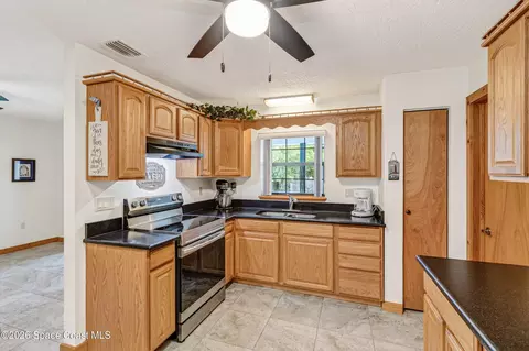 Kitchen - 648 Orange Ct, Rockledge, FL 32955 photo 2 of 5