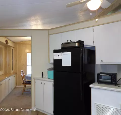 Kitchen - 1925 Live Oak St NE, Palm Bay, FL 32905 photo 2 of 2