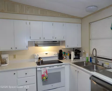 Kitchen - 1925 Live Oak St NE, Palm Bay, FL 32905 photo 1 of 2