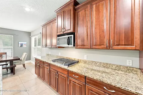 Kitchen - 1329 Tipperary Dr, Melbourne, FL 32940 photo 3 of 7