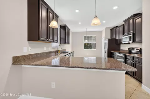 Kitchen - 6448 Van Ness Dr, Melbourne, FL 32940 photo 1 of 4