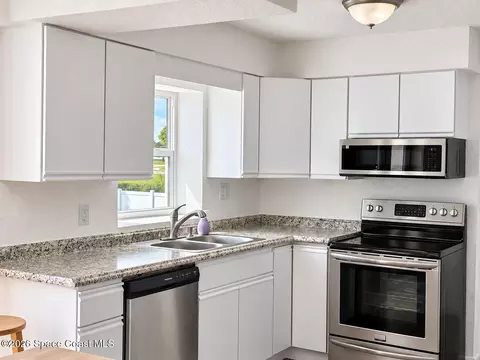 Kitchen - 1308 Sun Cir W, Melbourne, FL 32935 photo 1 of 3