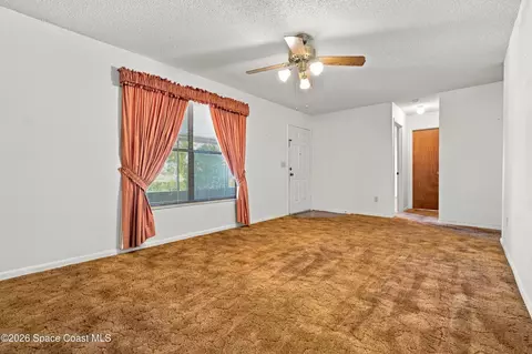 Living - 6325 Allmont St, Cocoa, FL 32927 photo 2 of 4