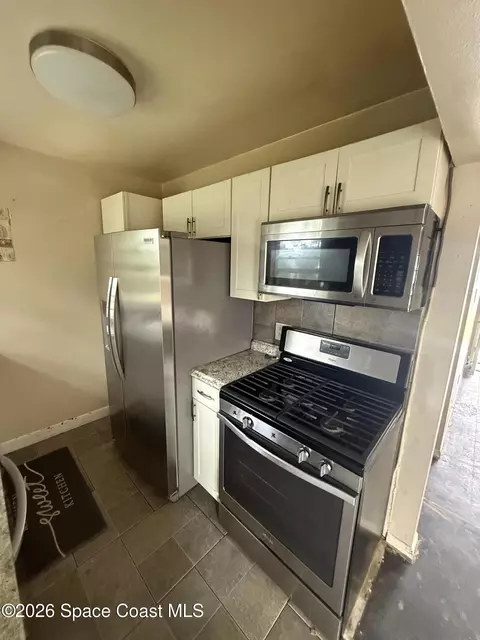 Kitchen - 2132 Allan Adale Rd, Melbourne, FL 32935 photo 2 of 2