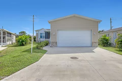 879 Laurel Cir, Barefoot Bay, FL 32976