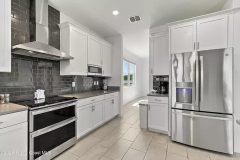 Kitchen - 495 Strand Dr, Melbourne Beach, FL 32951 photo 9 of 10
