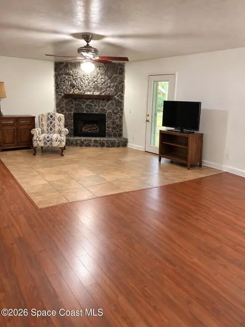 Living - 1671 Ford Rd, Mims, FL 32754 photo 1 of 2