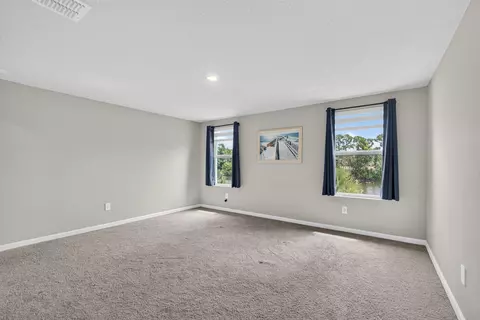 Bedroom - 5786 SEdgewater Cir, Stuart, FL 34997 photo 5 of 6