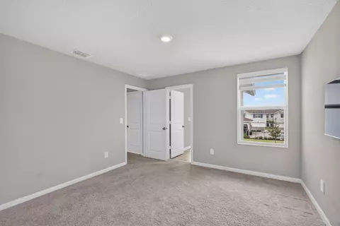 Bedroom - 5786 SEdgewater Cir, Stuart, FL 34997 photo 3 of 6