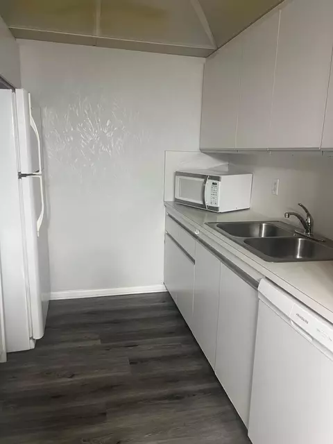 Kitchen - 3402 Bimini Ln #E2, Coconut Creek, FL 33066 photo 2 of 2