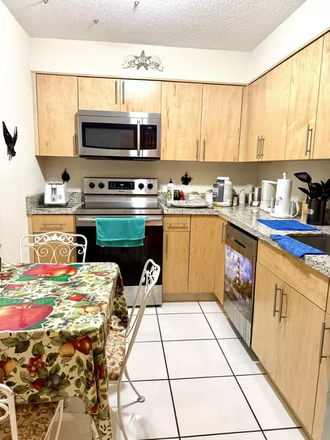 Kitchen - 101 Briny Ave #409, Pompano Beach, FL 33062 photo 1 of 4