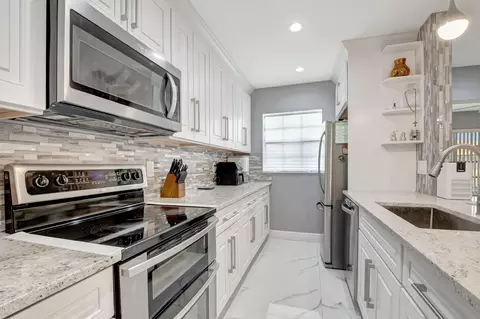 Kitchen - 14010 Nesting Way #B, Delray Beach, FL 33484 photo 2 of 7