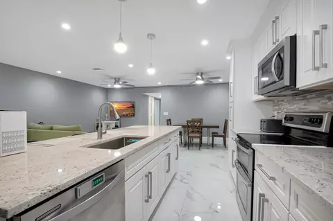 Kitchen - 14010 Nesting Way #B, Delray Beach, FL 33484 photo 3 of 7