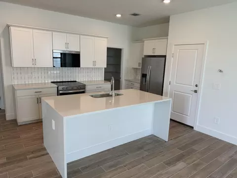 Kitchen - 6781 SE Park Trace Dr, Stuart, FL 34997 photo 2 of 2