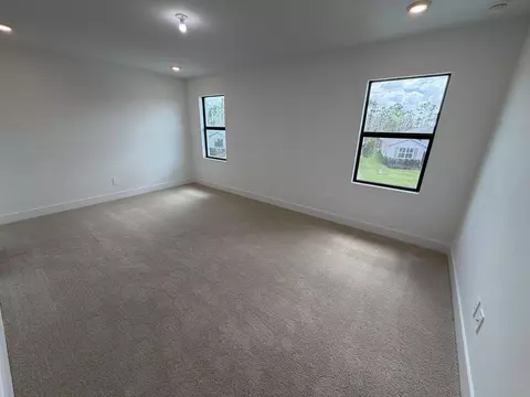 Bedroom - 6781 SE Park Trace Dr, Stuart, FL 34997 photo 1 of 4