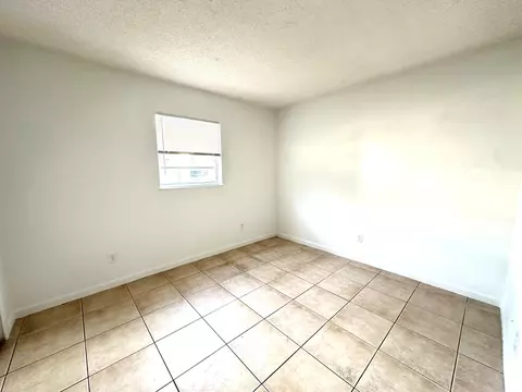 Bedroom - 3365 SE Garden St #3365, Stuart, FL 34997 photo 7 of 11