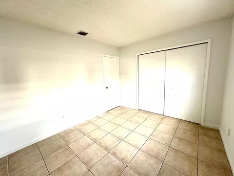 Bedroom - 3365 SE Garden St #3365, Stuart, FL 34997 photo 6 of 11