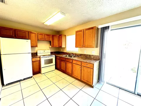 Kitchen - 3365 SE Garden St #3365, Stuart, FL 34997 photo 3 of 3