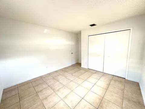 Bedroom - 3365 SE Garden St #3365, Stuart, FL 34997 photo 8 of 11