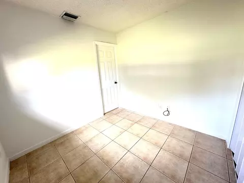 Bedroom - 3365 SE Garden St #3365, Stuart, FL 34997 photo 10 of 11