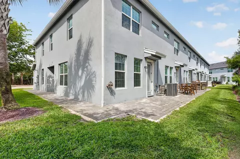 Exterior - 1887 SE Ocean Cove Way, Stuart, FL 34996 photo 8 of 12