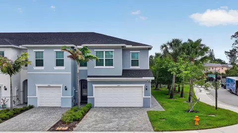 Exterior - 1887 SE Ocean Cove Way, Stuart, FL 34996 photo 4 of 12