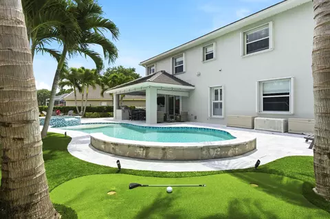 Exterior - 573 Cocoplum Dr E, Jupiter, FL 33458 photo 2 of 7
