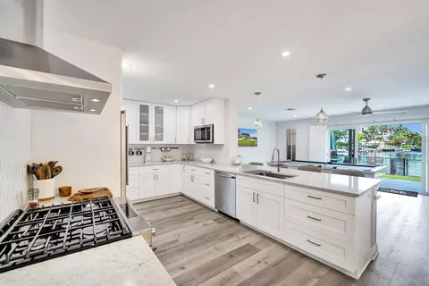 Kitchen - 381 SE 3rd St, Pompano Beach, FL 33060 photo 2 of 6