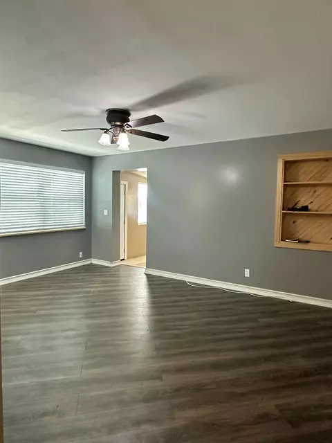 Living - 1005 NW 5th St, Okeechobee, FL 34972 photo 2 of 4