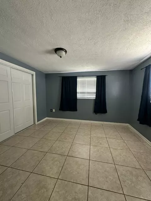Bedroom - 1005 NW 5th St, Okeechobee, FL 34972 photo 1 of 3