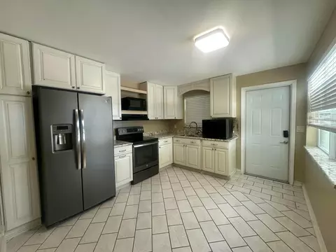 Kitchen - 1005 NW 5th St, Okeechobee, FL 34972 photo 2 of 2